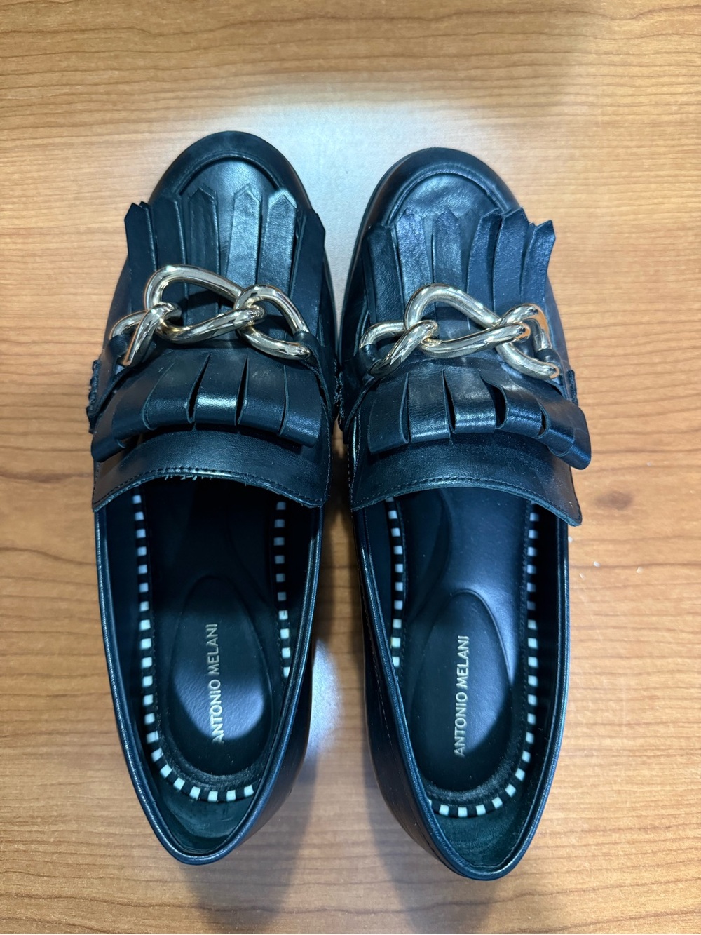 ANTONIO MELANI Black Leather Kiltie Loafers with Gold Chain Accent